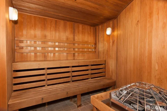 a large room with lots of chairs and chandelier