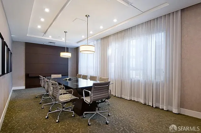 a view of street along with house and trees