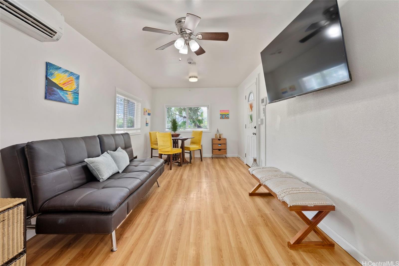 87-1423 Akowai Road Waianae, HI 96792 - Photo 13 of 24 a living room with furniture and a wooden floor