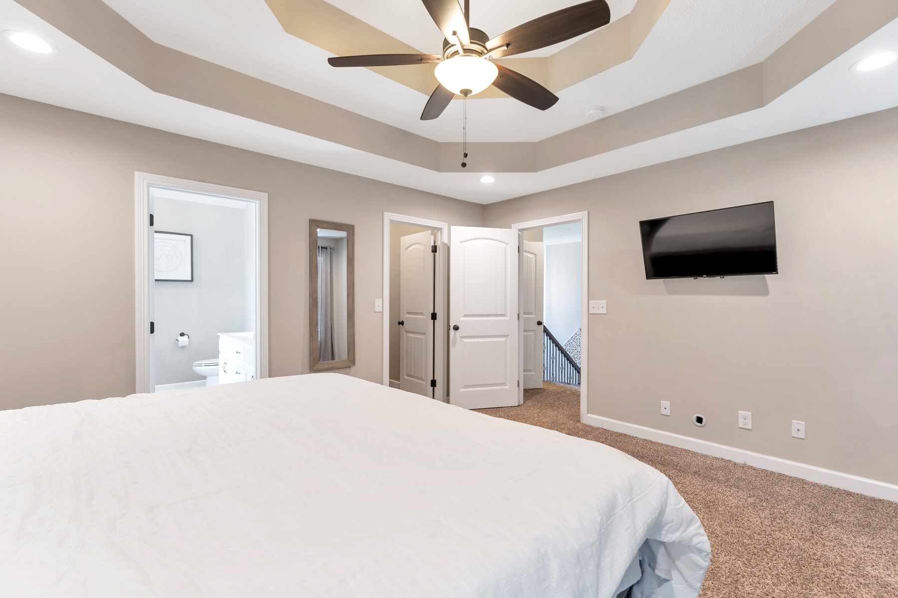 723 Backwind Lane Clarksville, TN 37040 - Photo 18 of 29 a bedroom with a bed and a flat screen tv