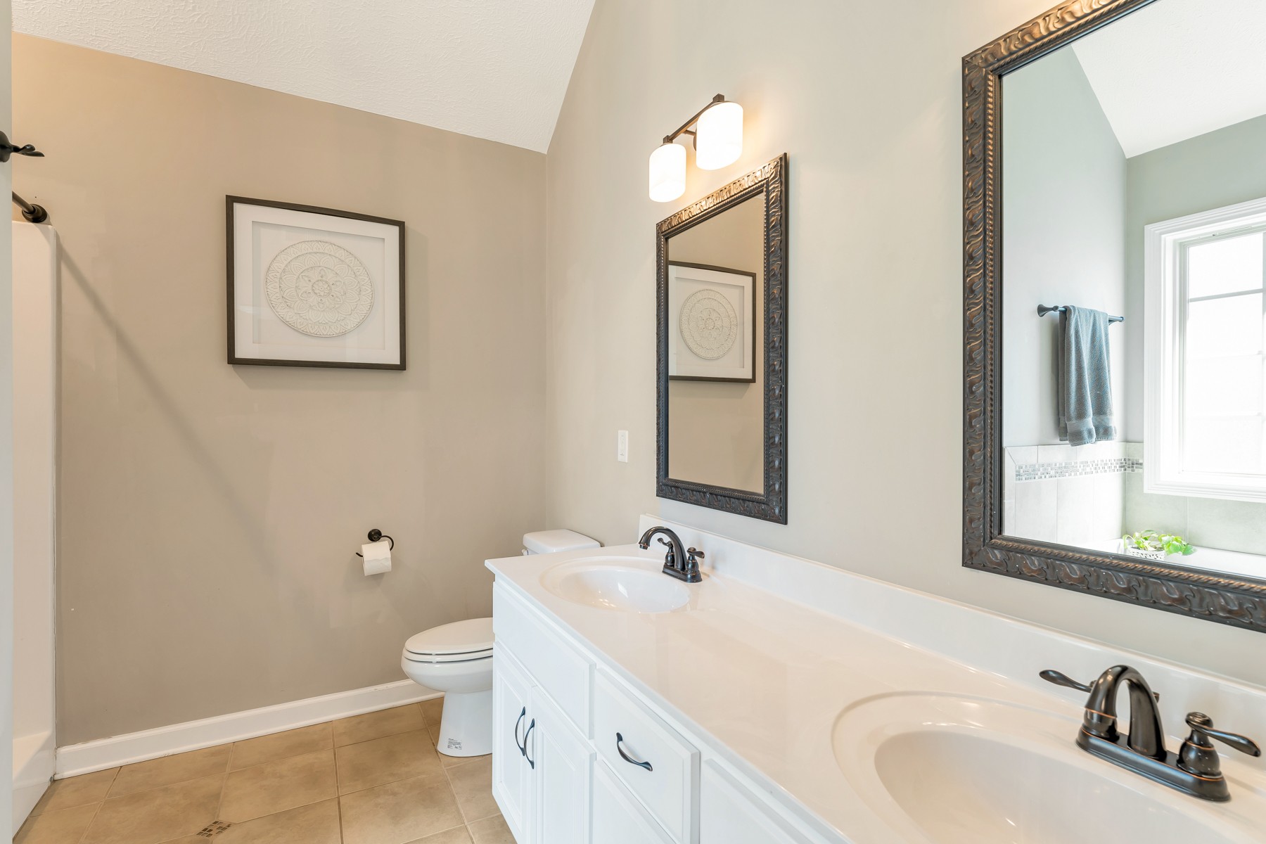723 Backwind Lane Clarksville, TN 37040 - Photo 19 of 29 a bathroom with a sink and a mirror