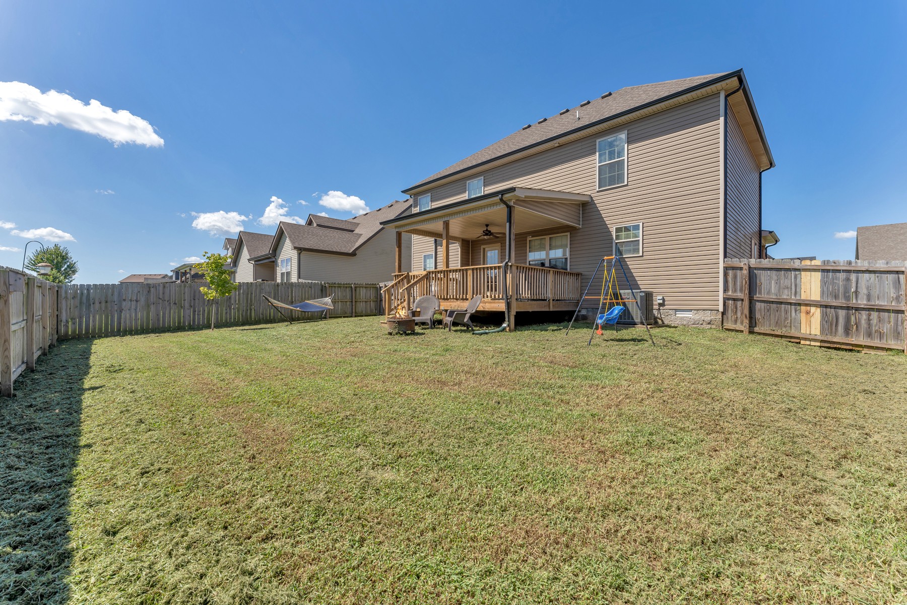 723 Backwind Lane Clarksville, TN 37040 - Photo 28 of 29 a view of a house with a yard and sitting area