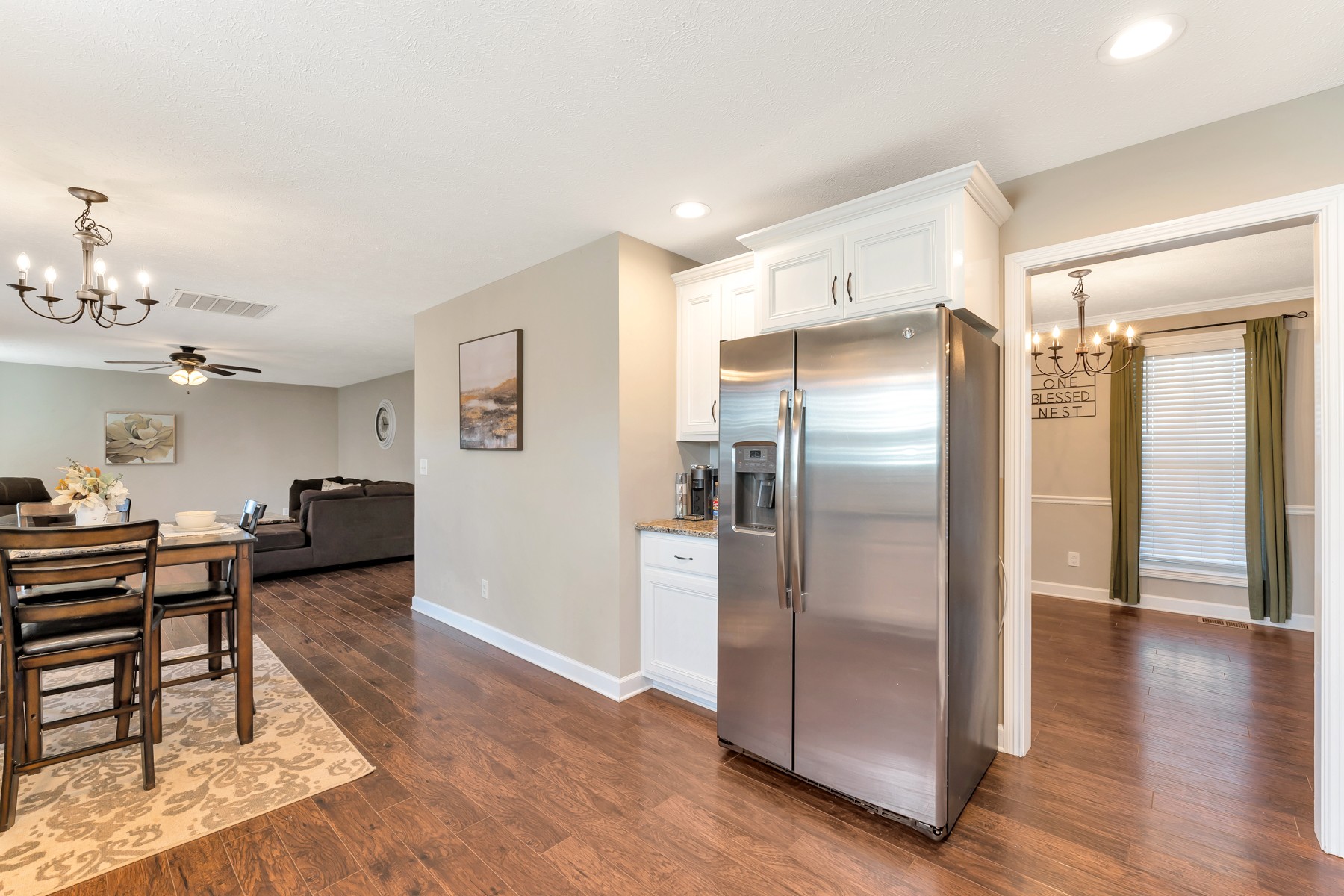723 Backwind Lane Clarksville, TN 37040 - Photo 8 of 29 a kitchen with stainless steel appliances a refrigerator and a stove top oven