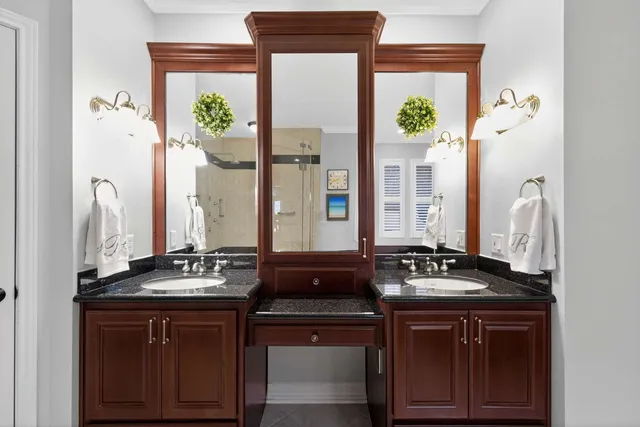 a bathroom with a shower and a sink