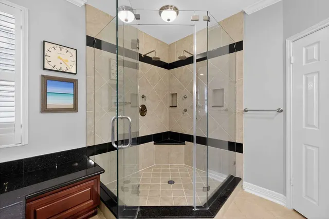 a living room with furniture a bed and a flat screen tv