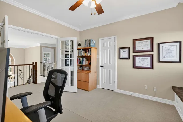 a bed room with a bed and a chandelier