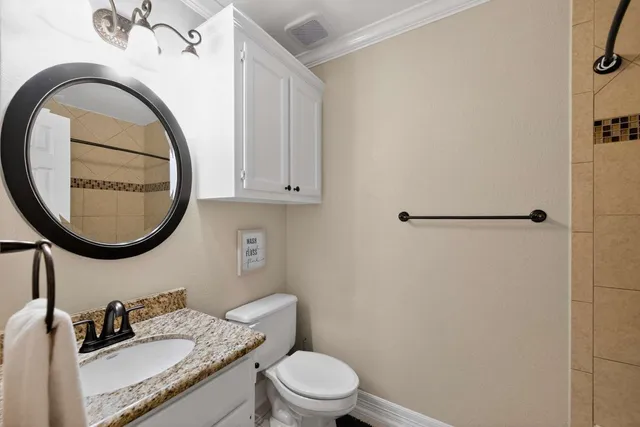 a view of a patio with table and chairs potted plants with wooden fence