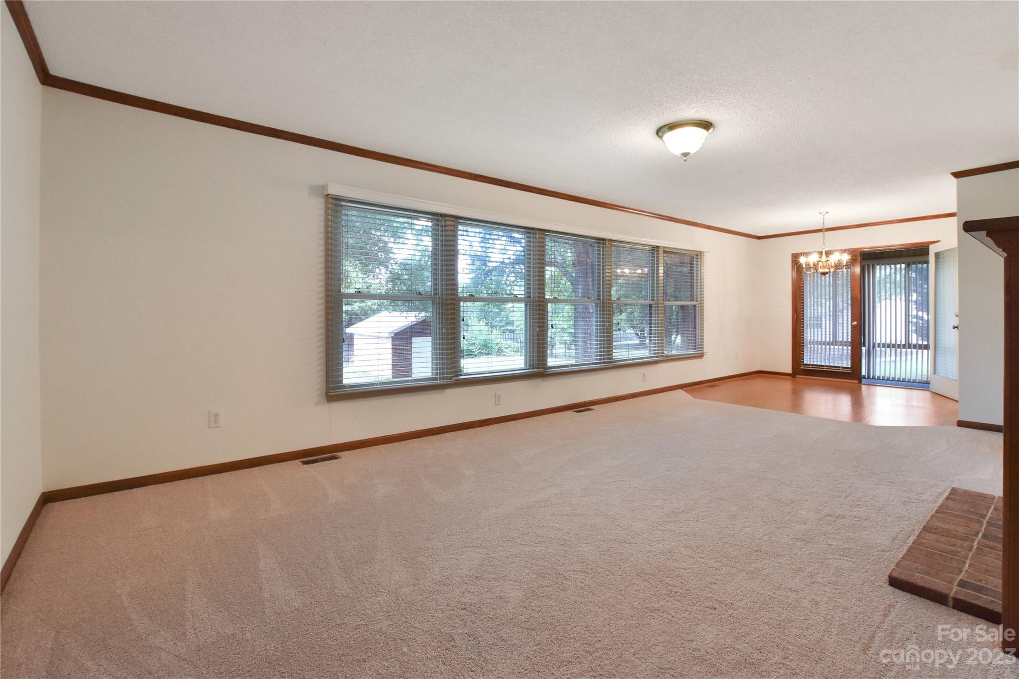 3075 Stoneybrook Drive Fort Mill, SC 29708 - Photo 6 of 31 wooden floor in an empty room with a window