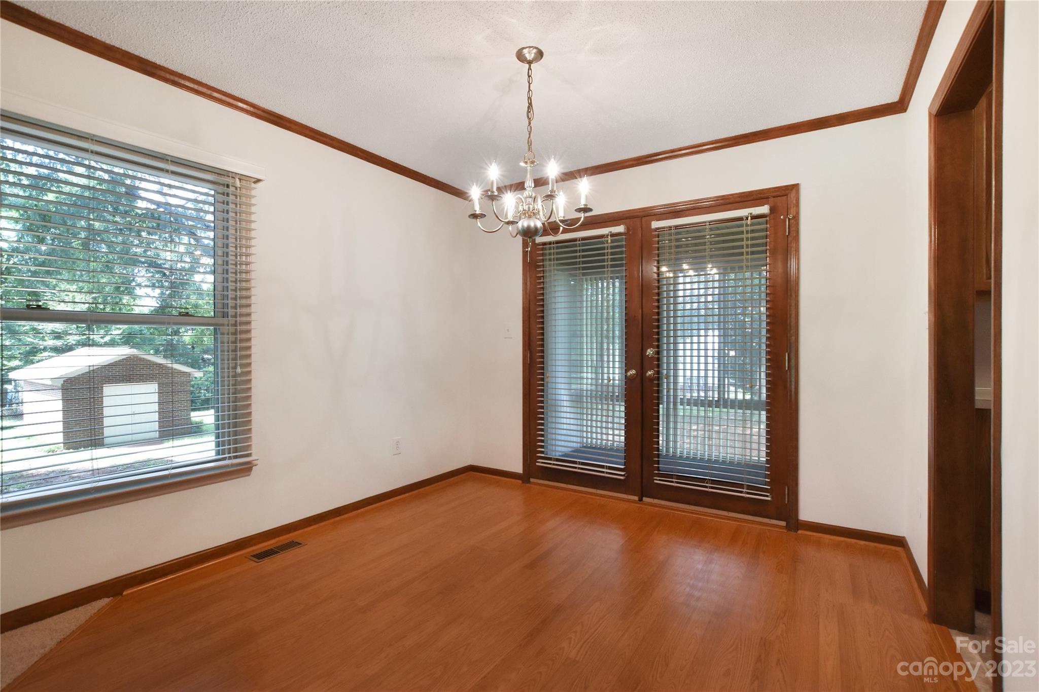 3075 Stoneybrook Drive Fort Mill, SC 29708 - Photo 7 of 31 en empty room with windows and outdoor view