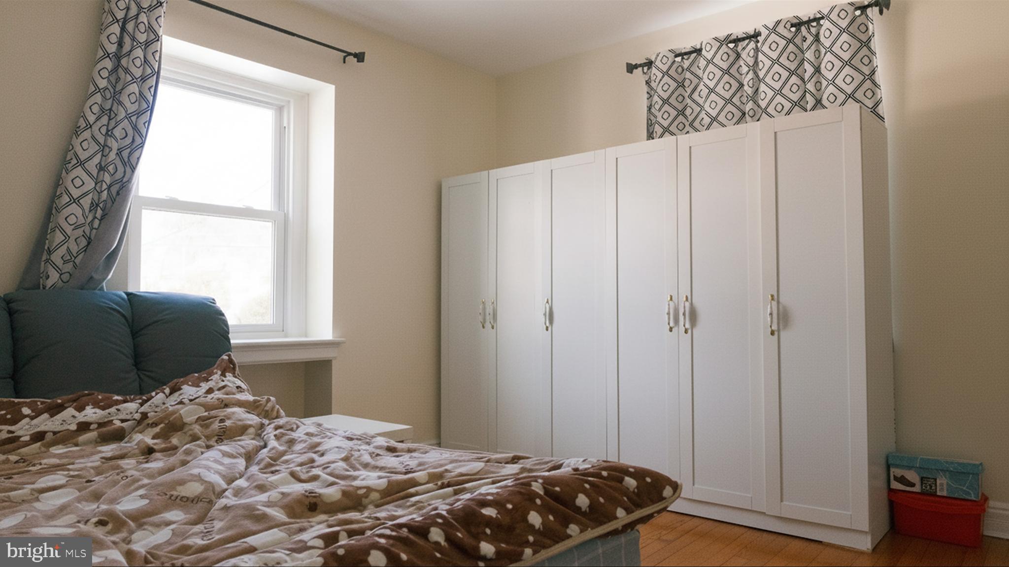 1058 Huntingdon Pike Huntingdon Valley, PA 19006 - Photo 15 of 25 a bedroom with a bed and a window