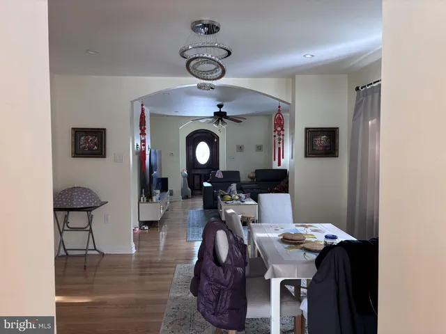 a view of a livingroom with furniture and a table