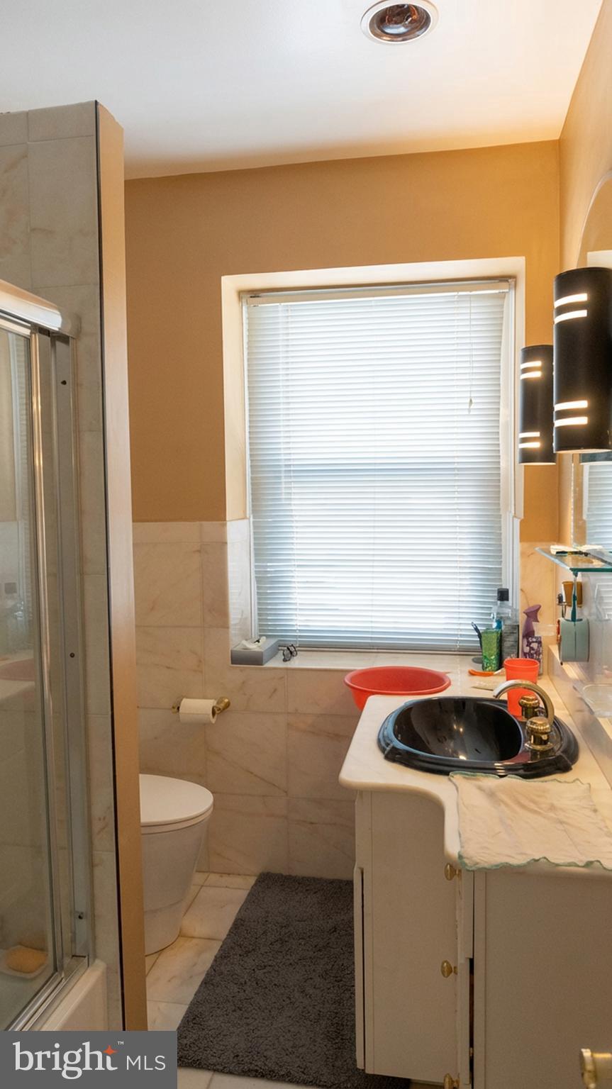1058 Huntingdon Pike Huntingdon Valley, PA 19006 - Photo 18 of 25 a bathroom with a sink and a vanity