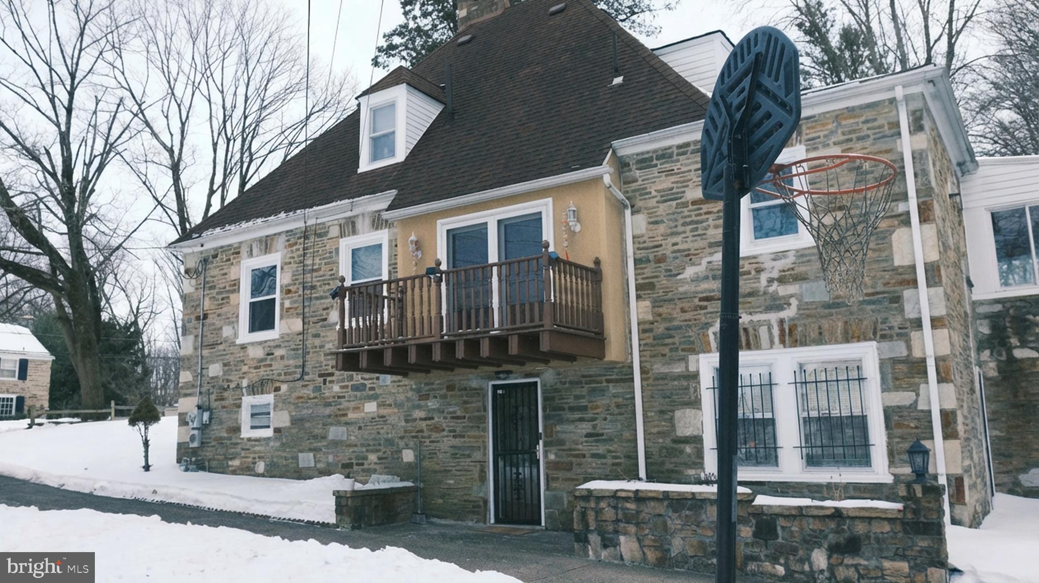 1058 Huntingdon Pike Huntingdon Valley, PA 19006 - Photo 2 of 25 a brick building with a outdoor space