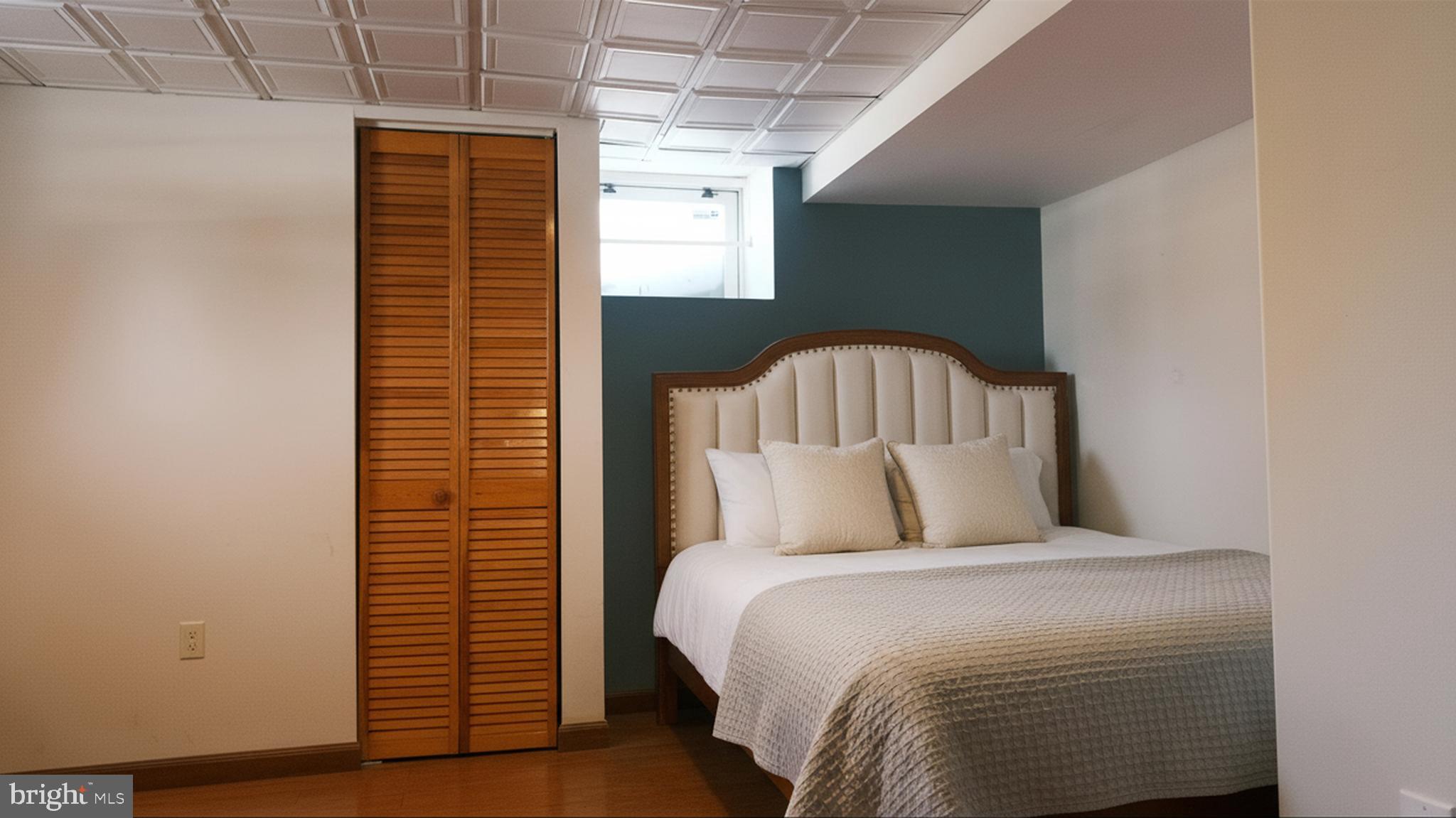 1058 Huntingdon Pike Huntingdon Valley, PA 19006 - Photo 25 of 25 a bedroom with a bed and a window