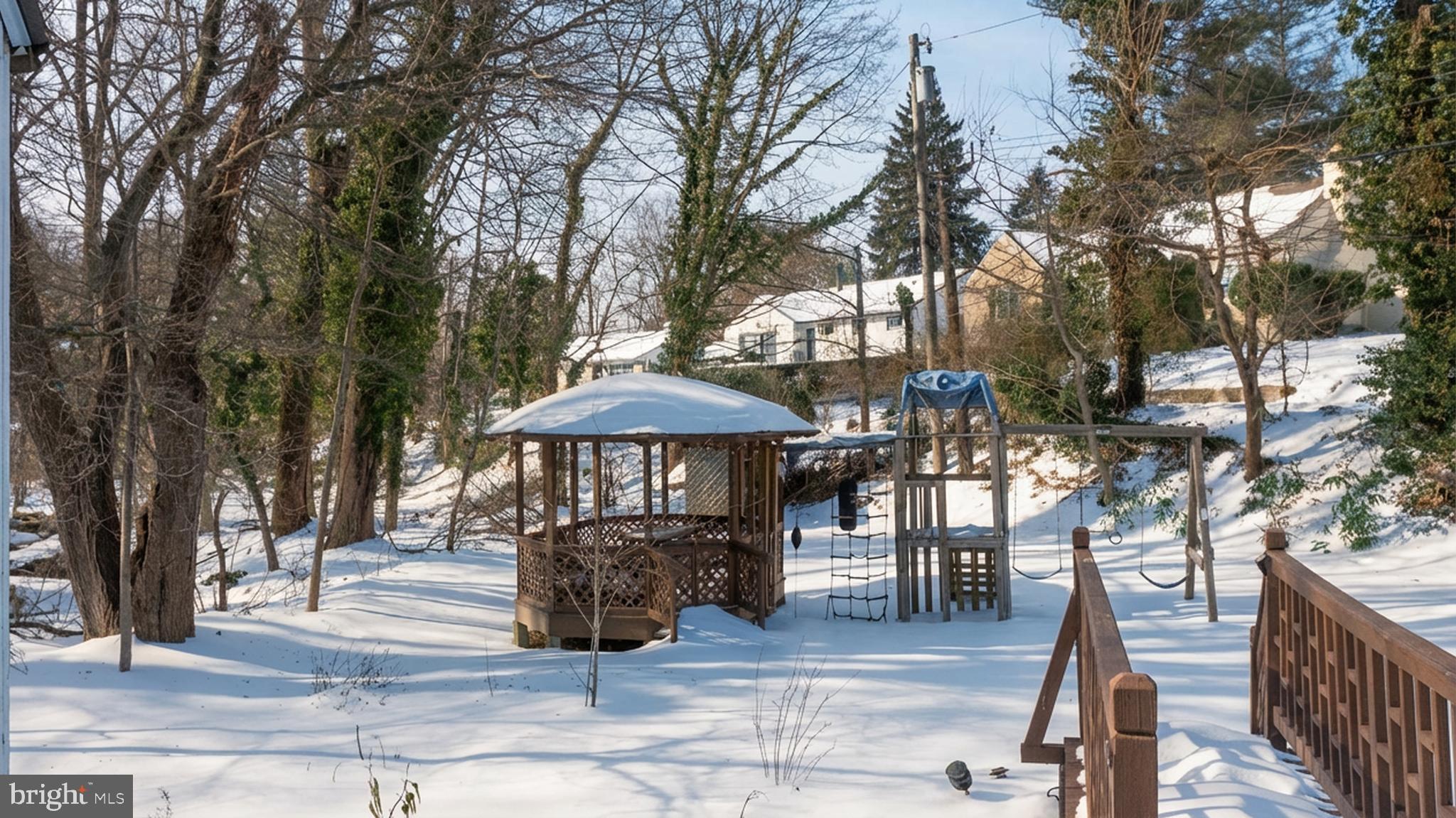 1058 Huntingdon Pike Huntingdon Valley, PA 19006 - Photo 4 of 25 a patio with a yard table and chairs