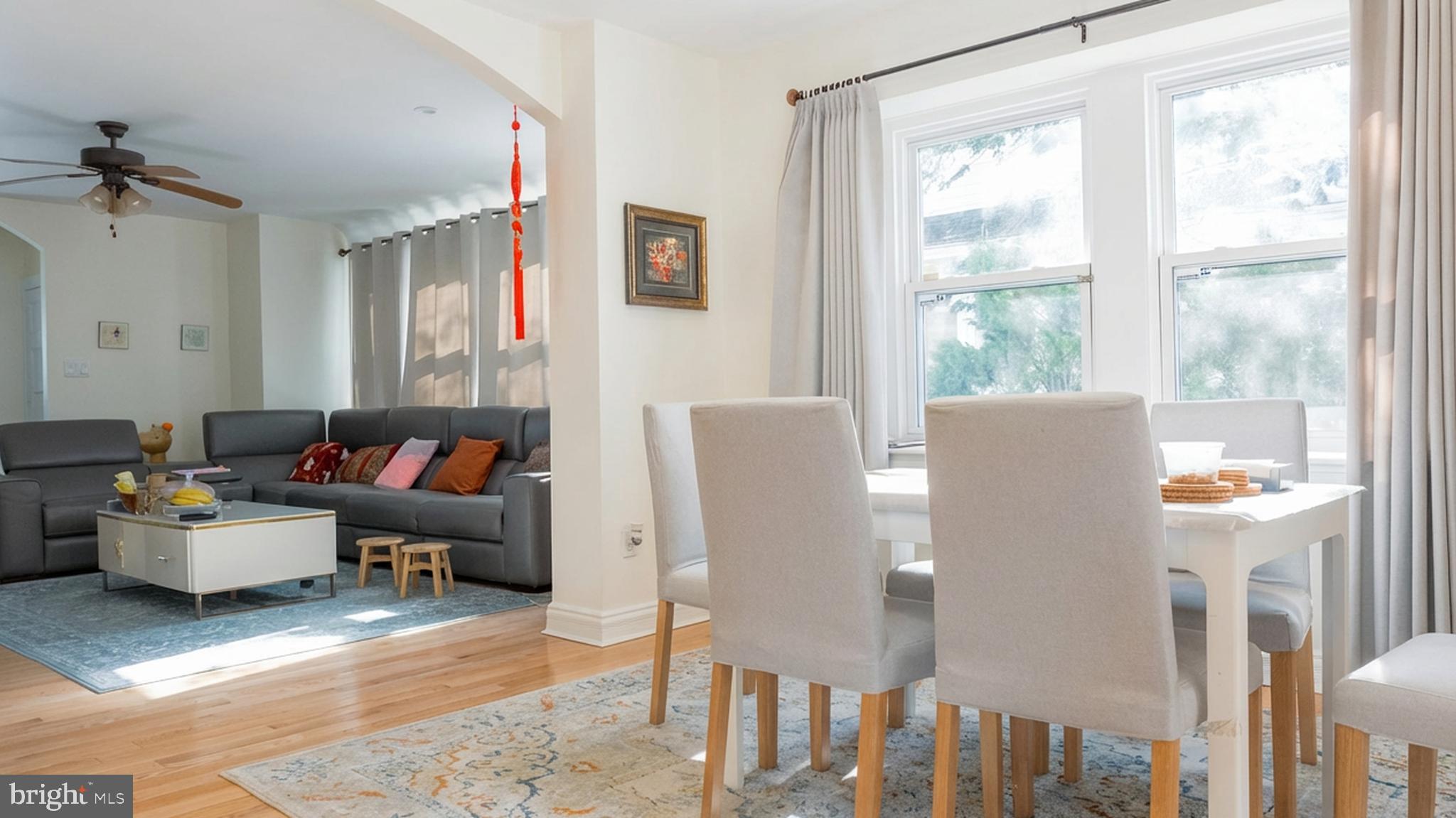 1058 Huntingdon Pike Huntingdon Valley, PA 19006 - Photo 8 of 25 a living room with furniture and a window