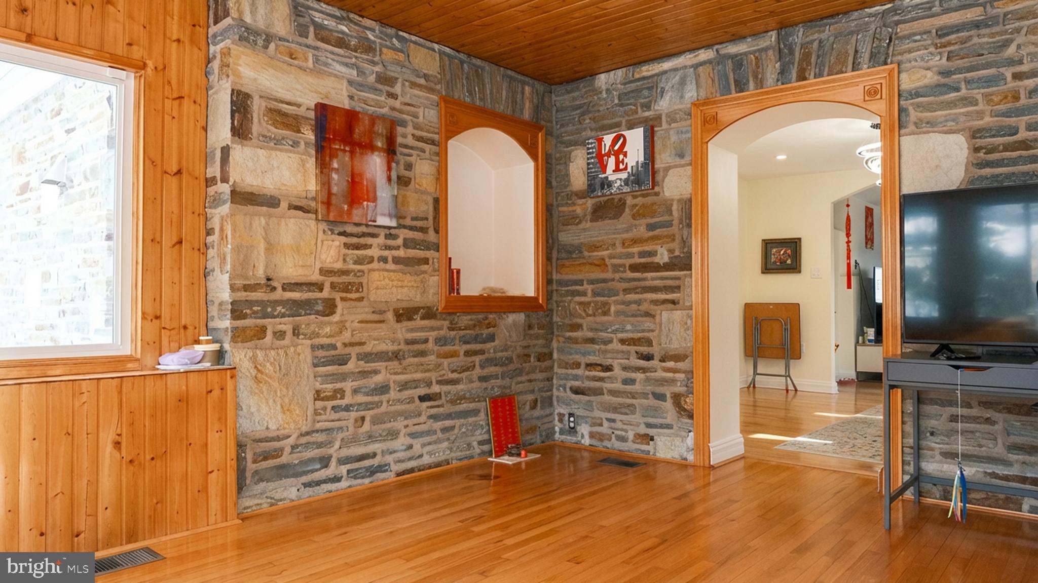 1058 Huntingdon Pike Huntingdon Valley, PA 19006 - Photo 10 of 25 a view of empty room with wooden floor and windows