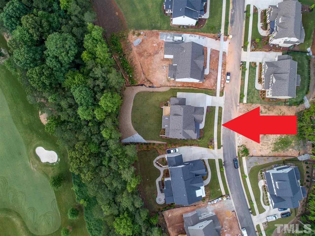113 Roseroot Court Holly Springs, NC 27540 - Photo 3 of 25 an aerial view of residential houses with outdoor space