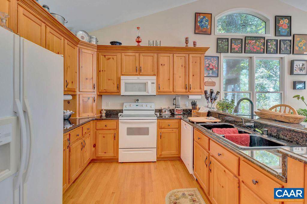 343 Wyland Road Buckingham, VA 23921 - Photo 14 of 46 a kitchen with stainless steel appliances a stove a sink and a refrigerator