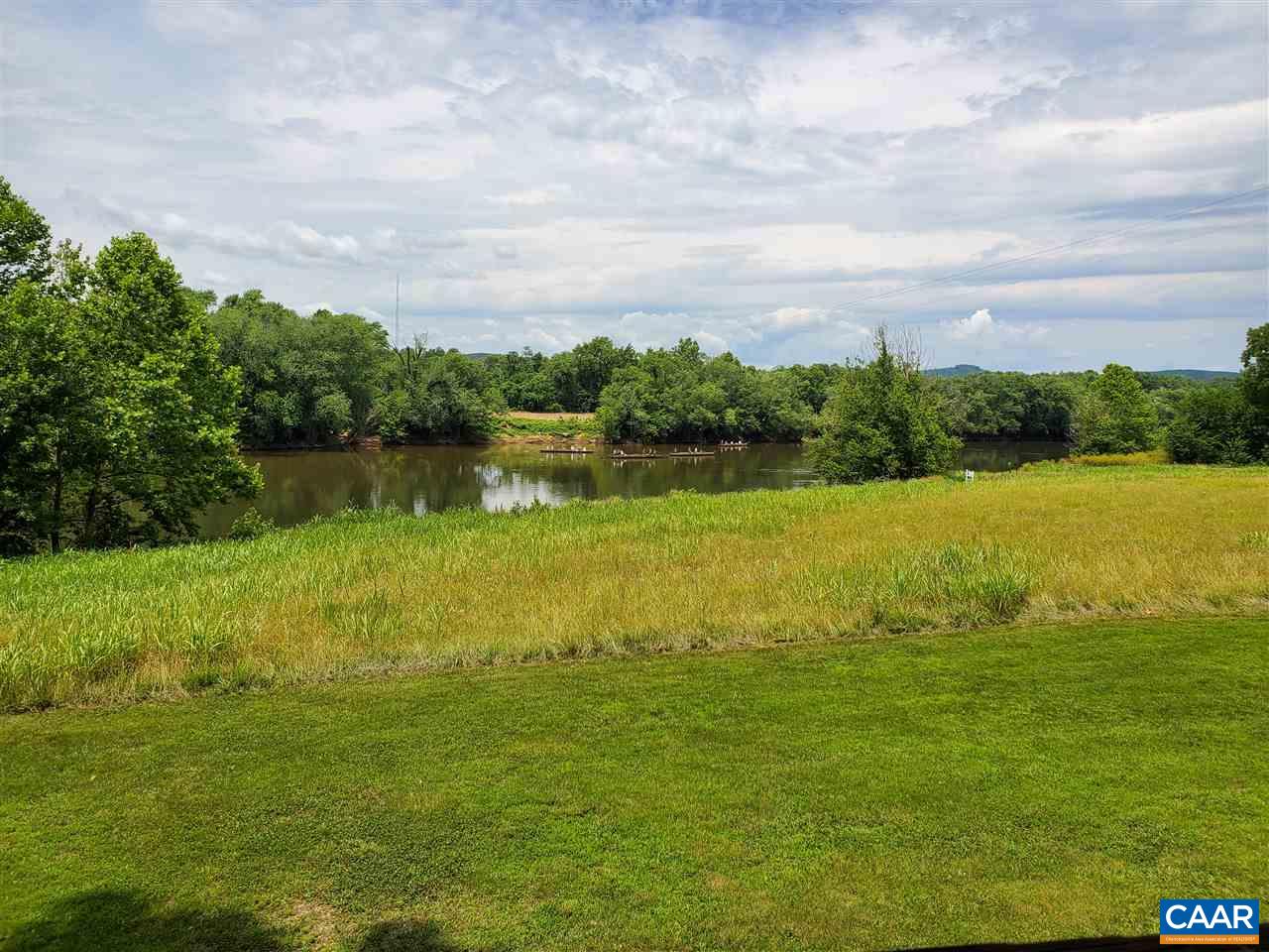 343 Wyland Road Buckingham, VA 23921 - Photo 29 of 46 a view of a lake with a city