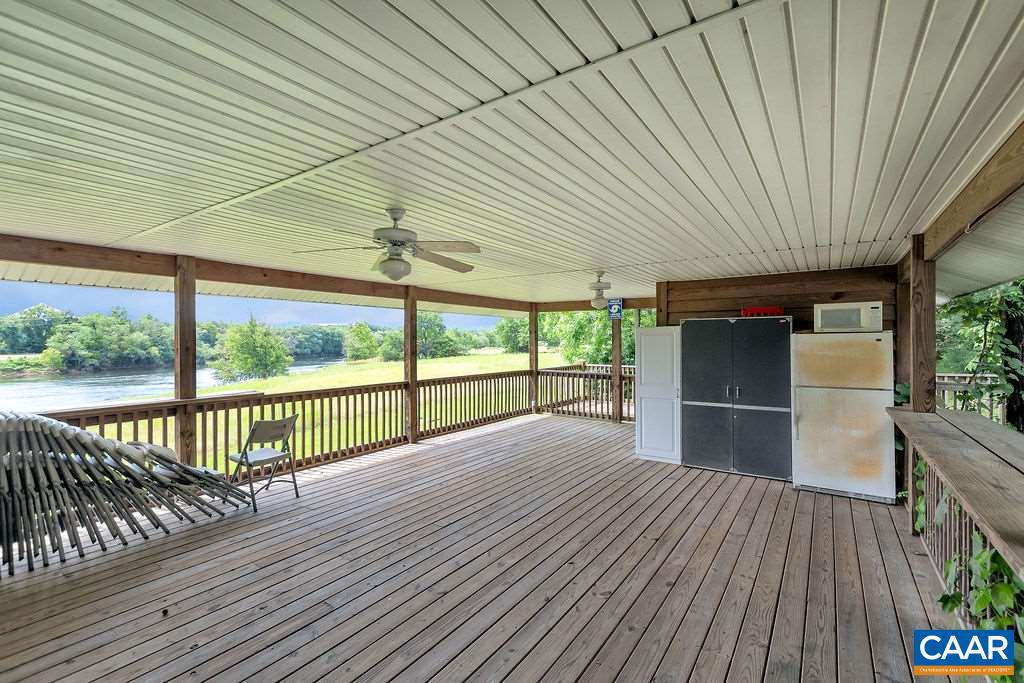 343 Wyland Road Buckingham, VA 23921 - Photo 32 of 46 a view of porch with wooden floor