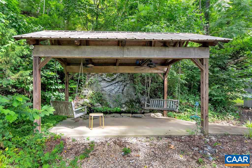 343 Wyland Road Buckingham, VA 23921 - Photo 35 of 46 a view of a chair and table in backyard of the house