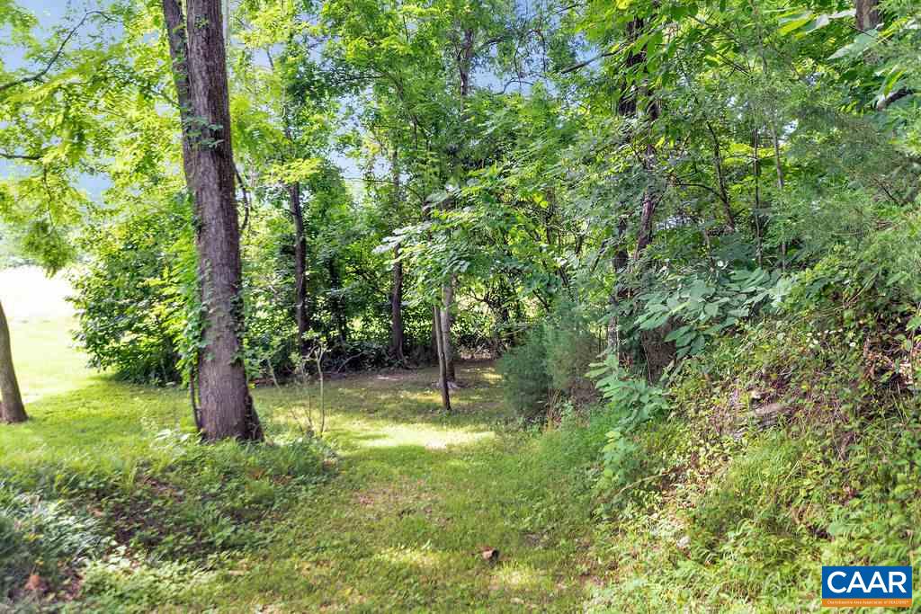 343 Wyland Road Buckingham, VA 23921 - Photo 38 of 46 a backyard of a house with swimming pool and outdoor seating