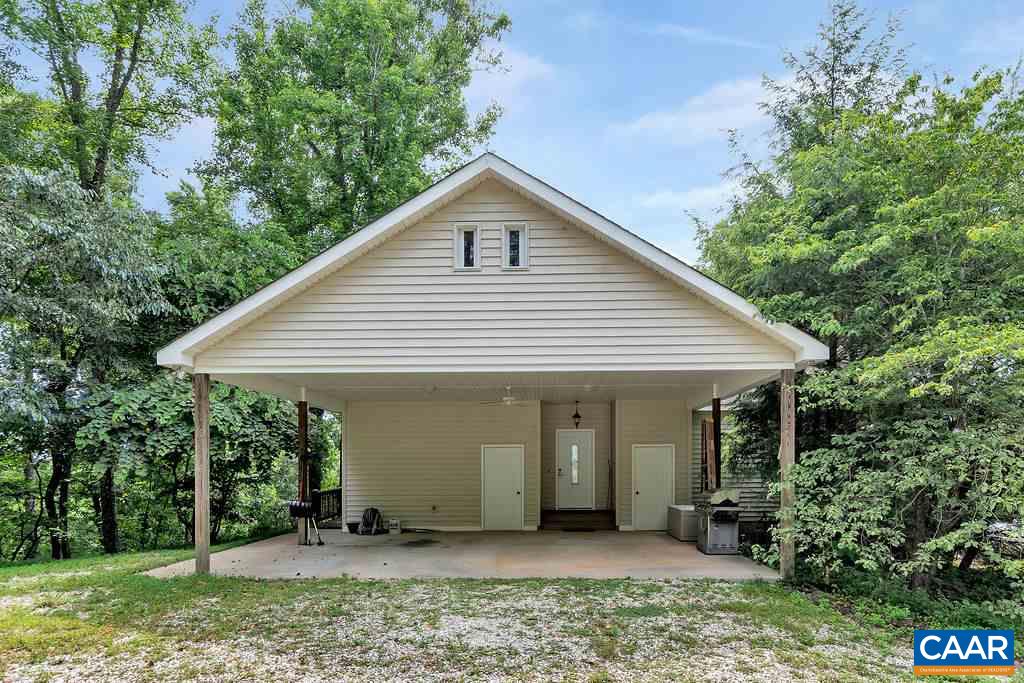 343 Wyland Road Buckingham, VA 23921 - Photo 6 of 46 a view of a house with a yard and potted plants