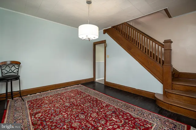 a view of entryway with wooden floor
