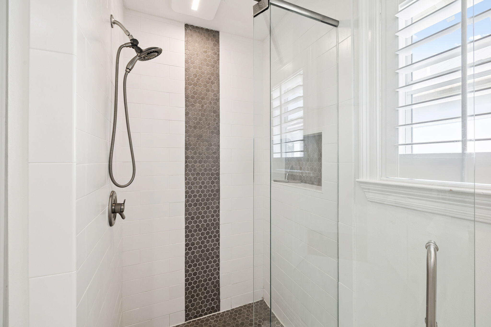 454 Beach Bike Way Inlet Beach, FL 32461 - Photo 31 of 45 a bathroom with a glass shower door