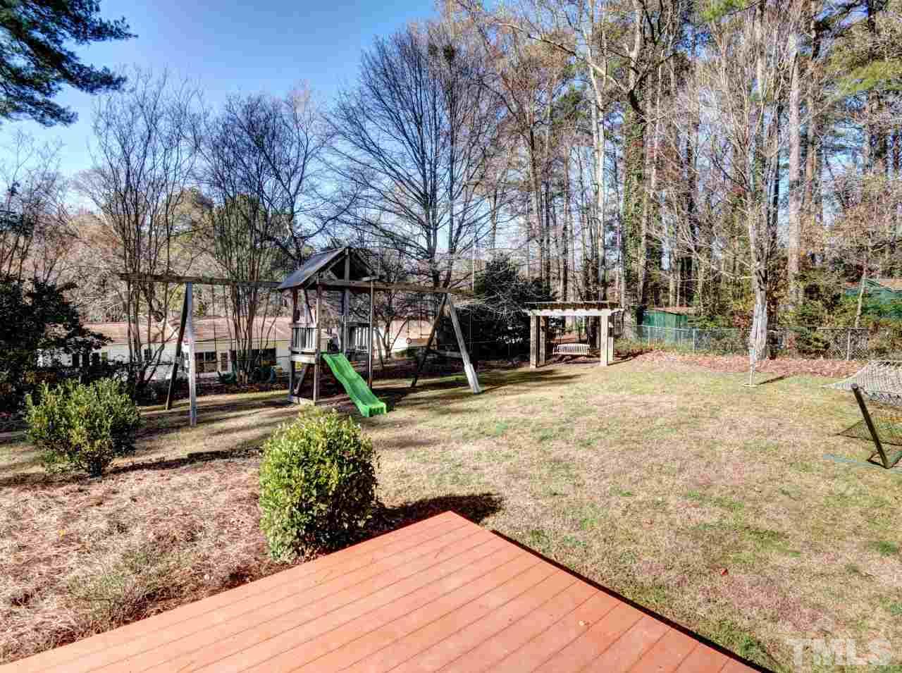 5708 Hayloft Circle Raleigh, NC 27606 - Photo 26 of 27 a view of a backyard with plants