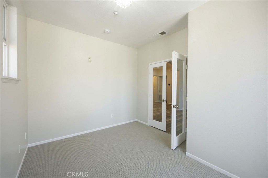 3603 Jetty Carlsbad, CA 92010 - Photo 21 of 43 an empty room with a natural light