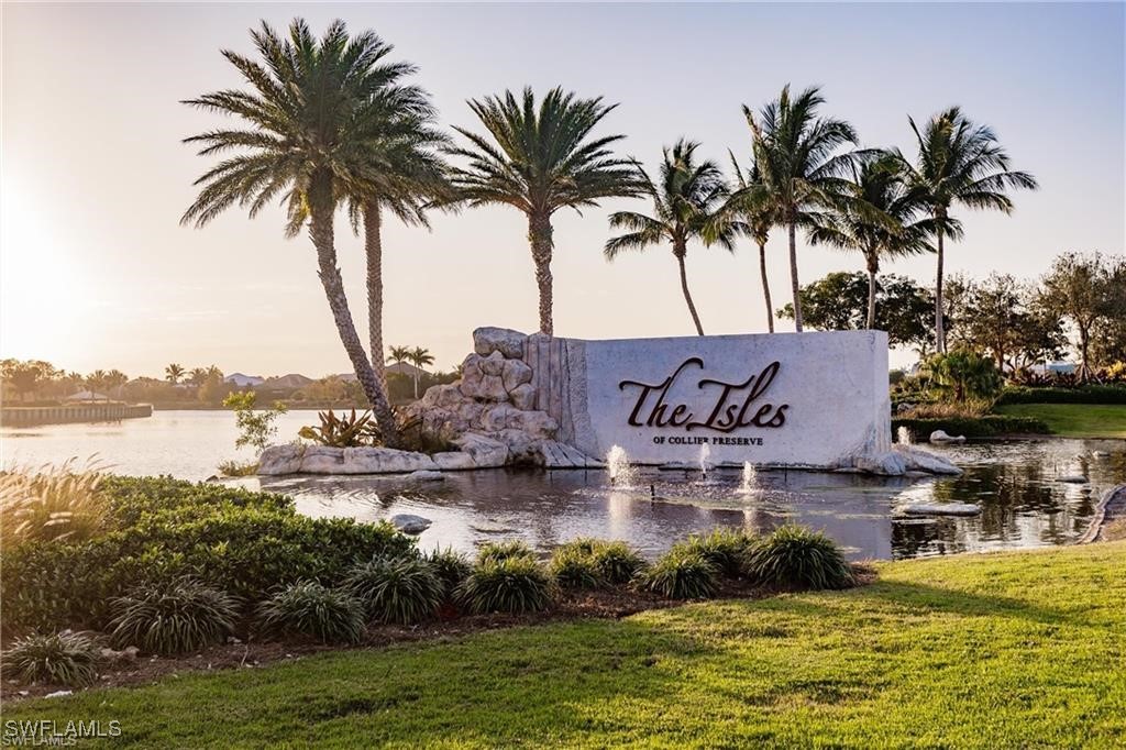 8903 Nevis Way Naples, FL 34112 - Photo 28 of 36 a view of swimming pool and lake view