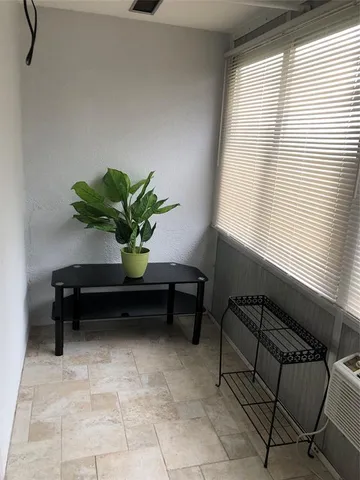 a view of a lake with houses in the back