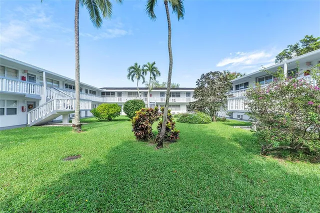 a view of chairs and tables in a patio