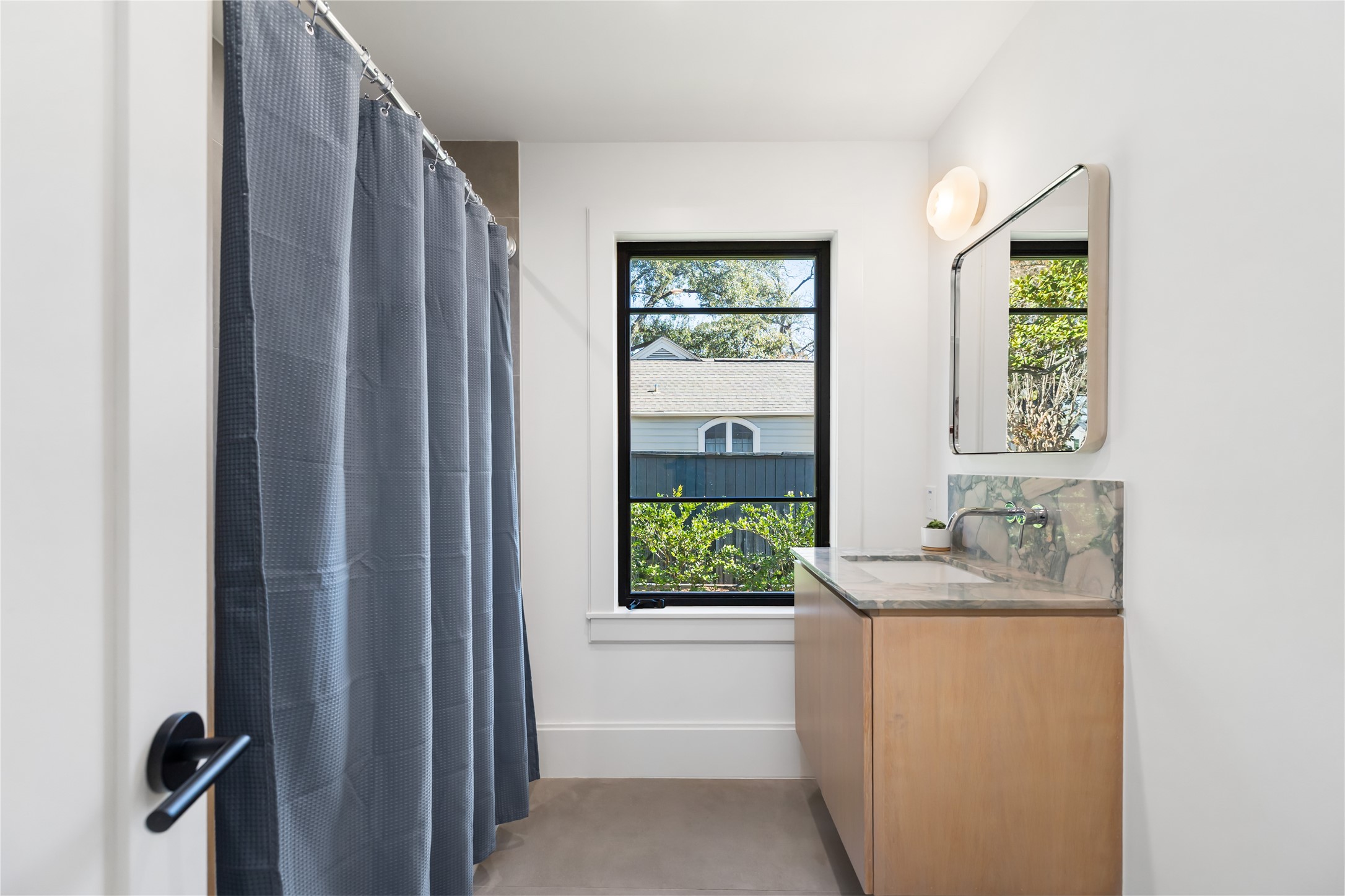 419 West 30th Street Houston, TX 77018 - Photo 34 of 45 a bathroom with a sink a toilet and a window