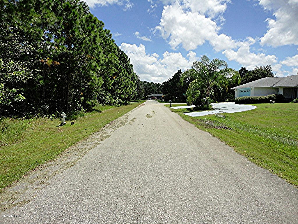 531-541 Topeka Road Southwest Palm Bay, FL 32908 - Photo 3 of 3 View of street south of property.