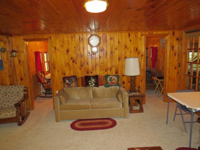 63 Salisbury Cove Road Otis, ME 04605 - Photo 10 of 34 Living room. Knotty pine throughout...