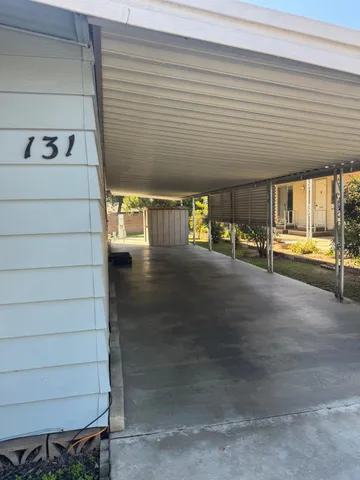 a view of a porch with seating space