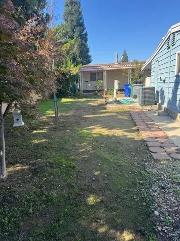 a view of a town with large trees