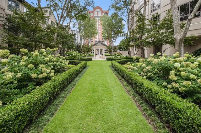a view of a garden with a fountain