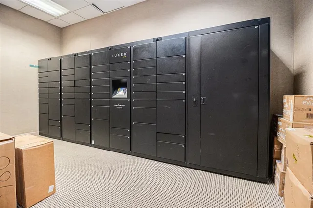 a bathroom with a shower and a sink