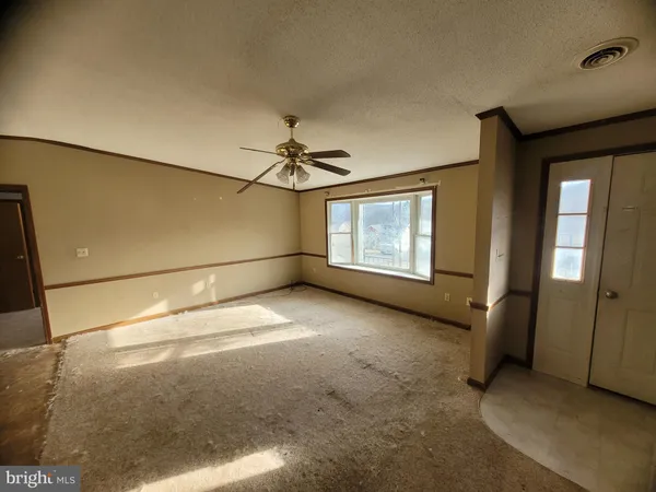 a view of a livingroom with a staircase