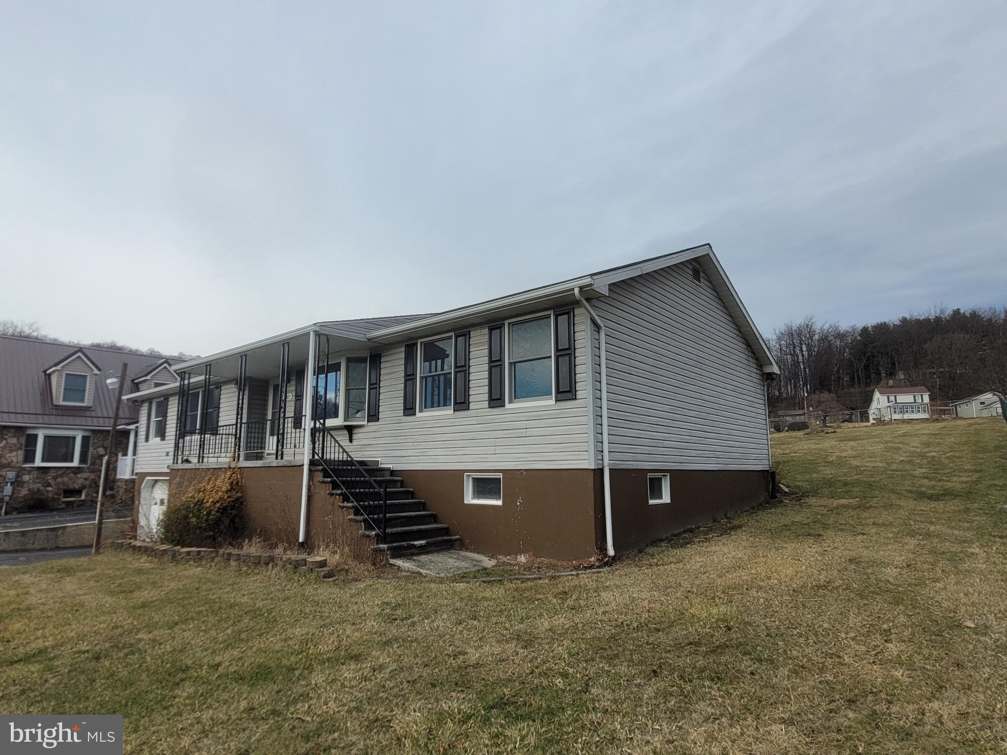 16821 Porter Road Northwest Frostburg, MD 21532 - Photo 2 of 39 a view of a house with a yard