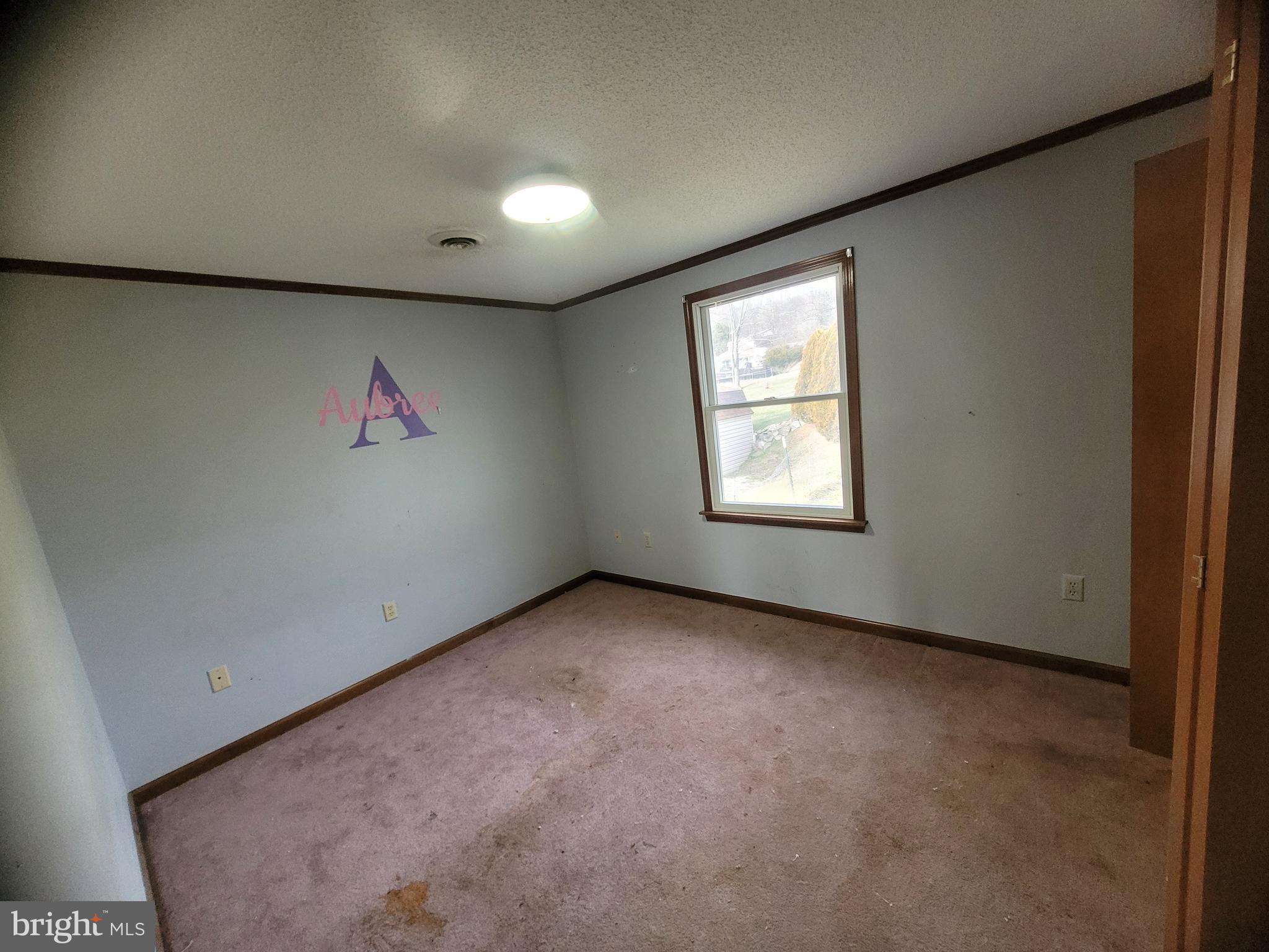 16821 Porter Road Northwest Frostburg, MD 21532 - Photo 22 of 39 an empty room with windows