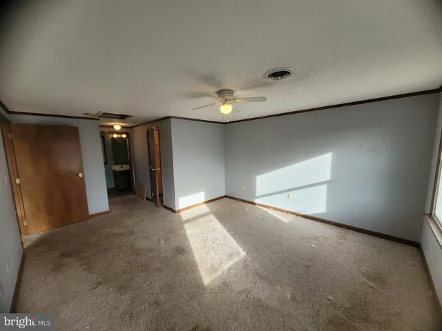 an empty room with windows