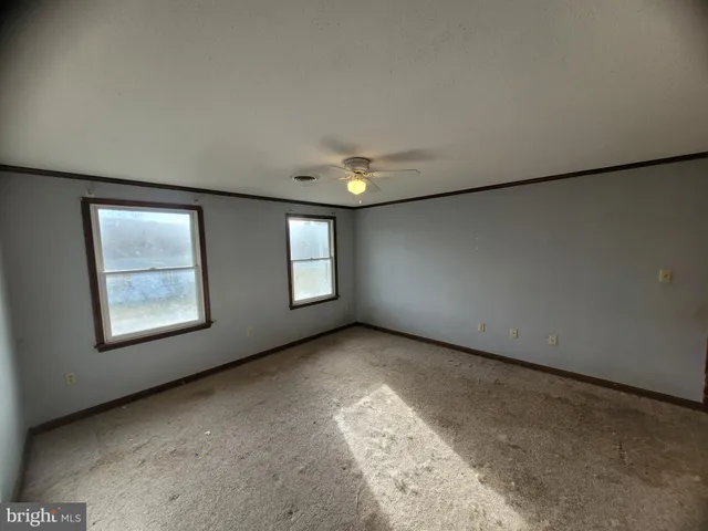a bathroom with a sink a mirror and a shower