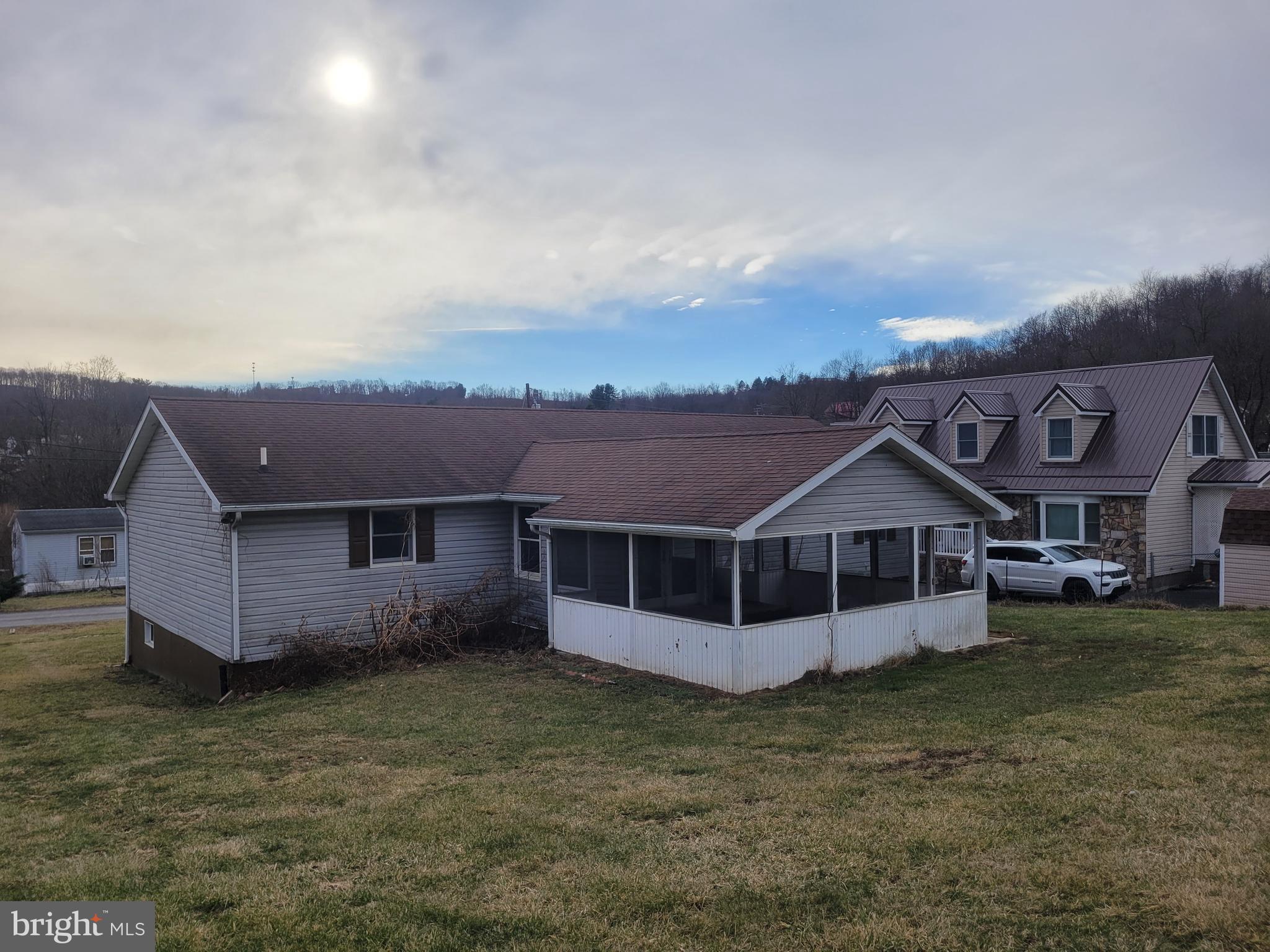 16821 Porter Road Northwest Frostburg, MD 21532 - Photo 4 of 39 an aerial view of a house with a yard and large trees