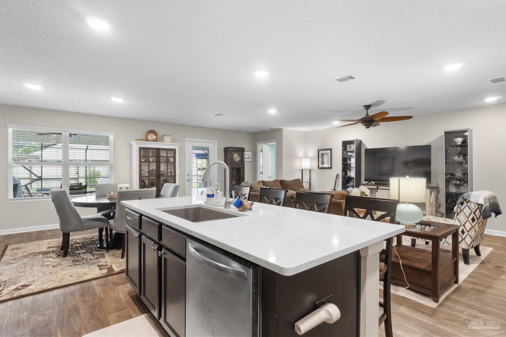 4082 Chickadee Street Milton, FL 32583 - Photo 13 of 43 a view of a dining room with furniture and window