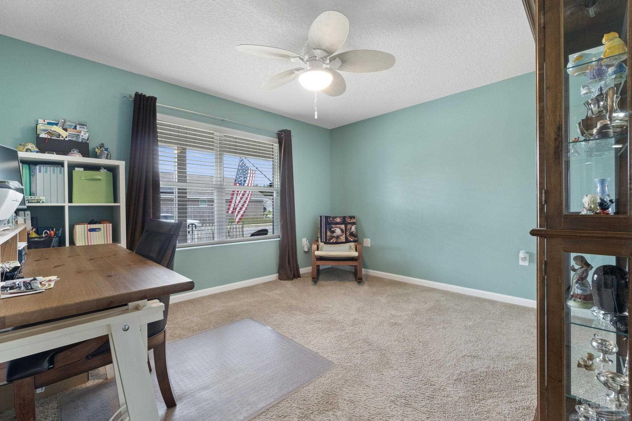 4082 Chickadee Street Milton, FL 32583 - Photo 23 of 43 a workspace with furniture and window